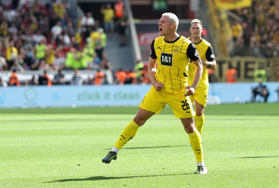 Dortmund revive champions league dream in leverkusen